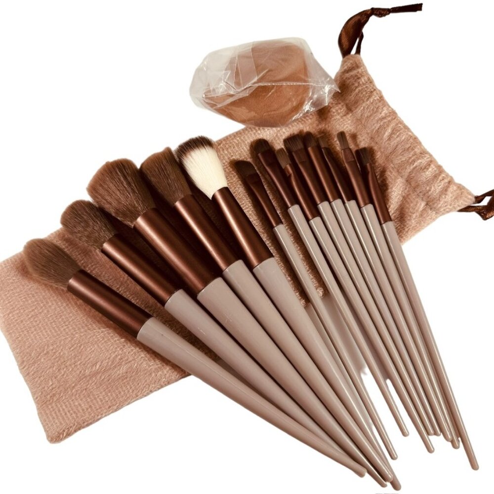 Complete makeup brush set with travel pouch and beauty blender NWT